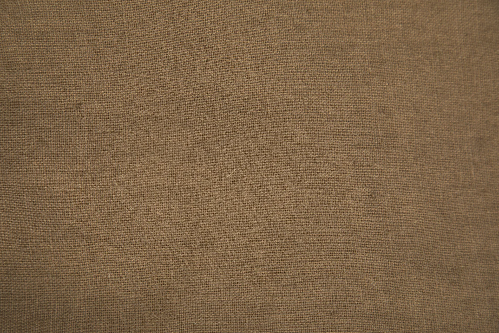 Close-up of a warm brown woven textile